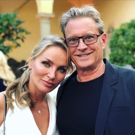 Eva Halina Rich and her husband of two decades Christopher Rich took a picture together.